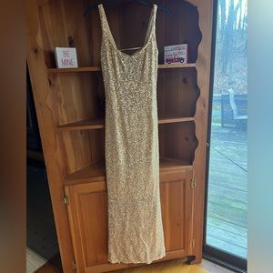 Sensational Gold lightweight sequin gown with criss cross back straps!